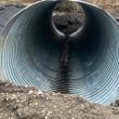 Placing the new culvert.